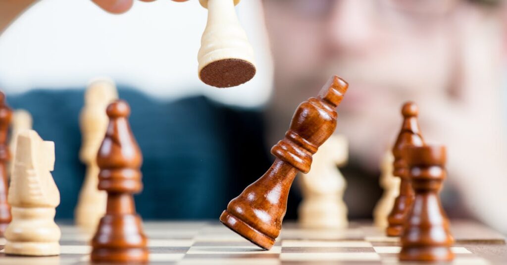 Close-up of a chess game with a focused player, emphasizing strategy and competition.